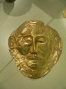 Een kopie van het dodenmasker van Agamemnon dat is gevonden in de graven. Het origineel ligt in het museum in Athene